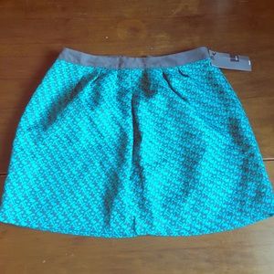 Women’s / Juniors teal geometric skirt.